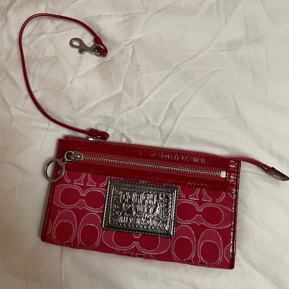 Never Used Coach Wristlet. Perfect condition